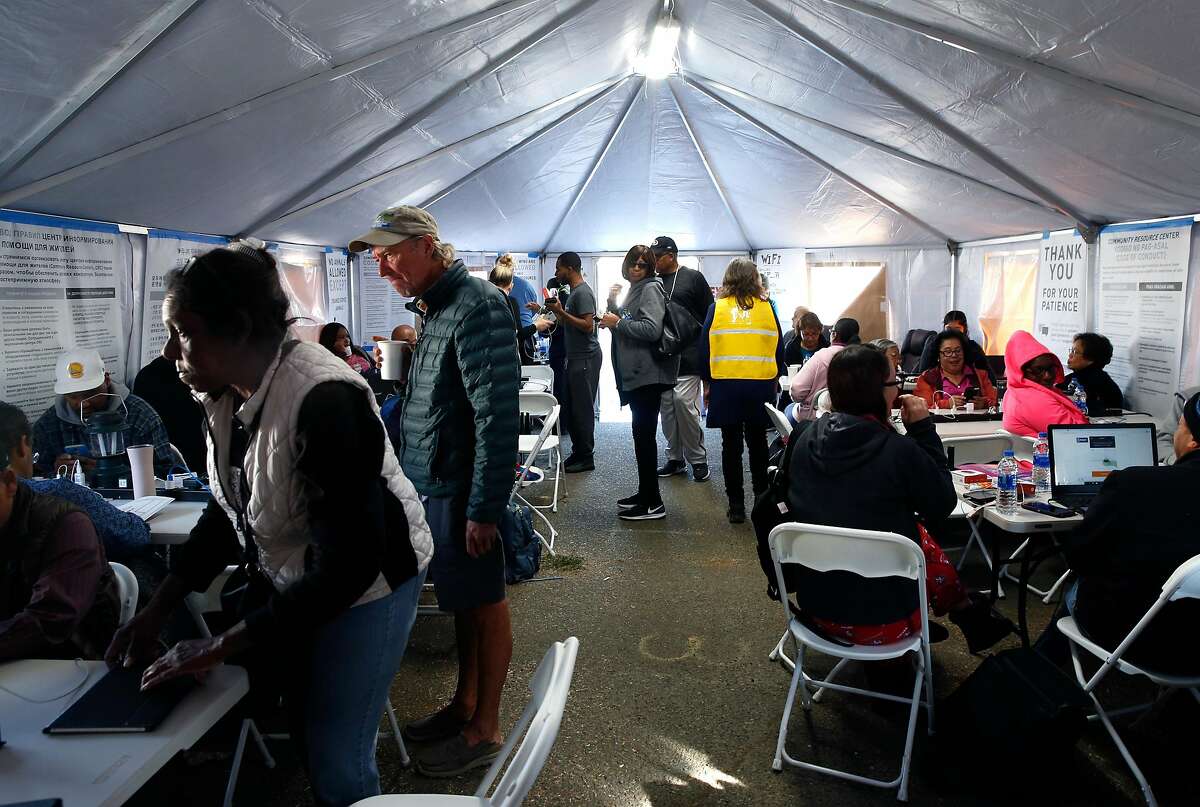 Residents affected by the widespread PG power outages at the utility's community resource center at the Solano County Fairgrounds on Tuesday, Oct. 29, 2019.