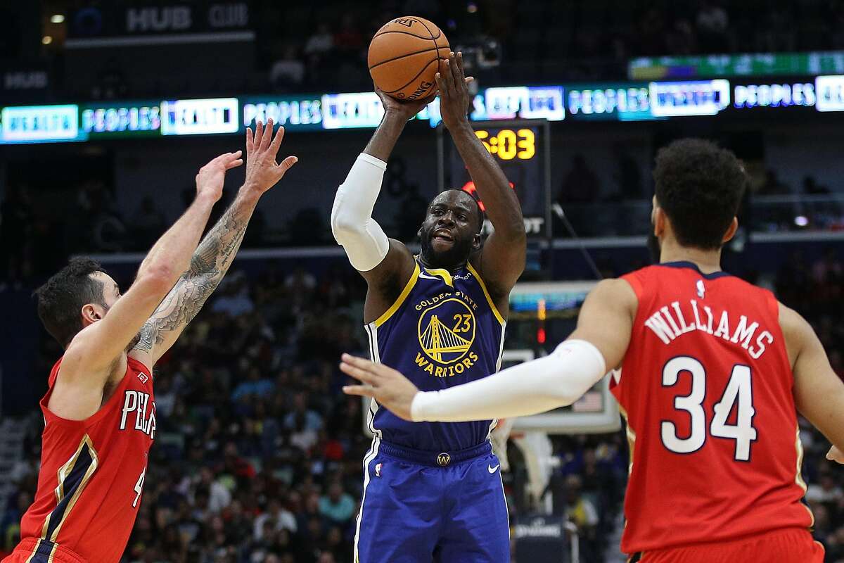 NEW ORLEANS, LOUISIANA - OCTOBER 28: Draymond Green #23 of the Golden State Warriors shoots the ball over JJ Redick #4 of the New Orleans Pelicans at Smoothie King Center on October 28, 2019 in New Orleans, Louisiana. NOTE TO USER: User expressly acknowledges and agrees that, by downloading and/or using this photograph, user is consenting to the terms and conditions of the Getty Images License Agreement (Photo by Chris Graythen/Getty Images)