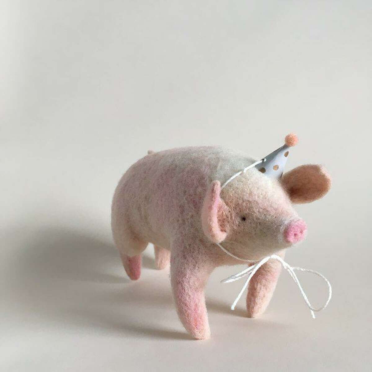 Petit Felts, which produced this festive pig, will be one of the artisans at Wilton Historical Society’s American Artisan Show.