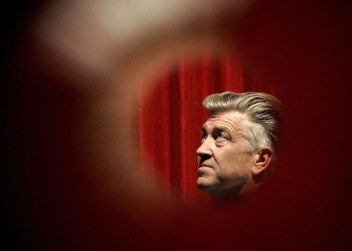The stories behind your favorite David Lynch movies In David Lynch’s 2018 biography-memoir hybrid “Room to Dream” (co-written with Kristine McKenna), the famous auteur explains how he felt his first film rather than “think it.” Lynch’s works are notoriously perplexing, but figuring them out isn’t the point. The filmmaker offers audiences an experience of cinema and its possibilities that may prove transcendent and emotional. His films don’t offer the popular popcorn-and-movie-going experience in which viewers simply sit back and watch the show. Instead, Lynch's movies immerse you—and it isn’t always pleasant. For 1977 audiences piling into midnight screenings to view the epically strange “Eraserhead,” watching was more akin to being caught somewhere between a boundless dream and tranquilizing nightmare. Viewers can’t help but wonder what is all means; but Lynch wants his films to be experienced by viewers, not figured out. Lynch also occupies a unique place as an artist. His films are experimental and arthouse but also come out of the Hollywood industry and feature movie stars. While his first film was cult, low-budget, and little-seen, it still caught the eye of producers. His sophomore effort, “The Elephant Man,” followed a traditional narrative but still held an artsy point of view and garnered a Best Picture Oscar nom. His third film, “Dune” was a big-budget studio production helmed by Hollywood bigwig Dino De Laurentiis. Lynch’s deeply original style is truly strange—but it's also alluring, watchable, and transfixing. Some of his stylistic signatures include surreal, eerie images rendered in high contrast black-and-white, or...