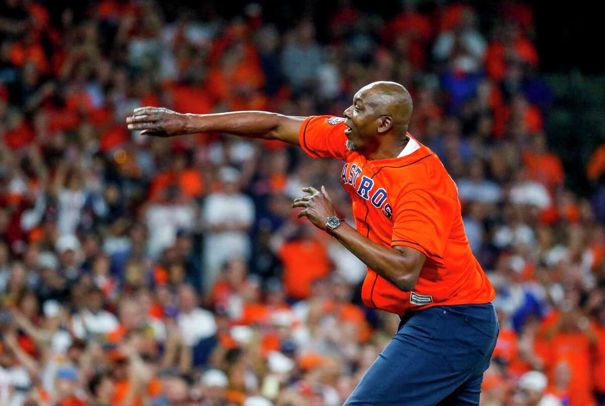 Hakeem Olajuwon throws out the ceremonial first pitch before Game 6 of the World Series at Minute Maid Park on Tuesday, Oct. 29, 2019, in Houston.