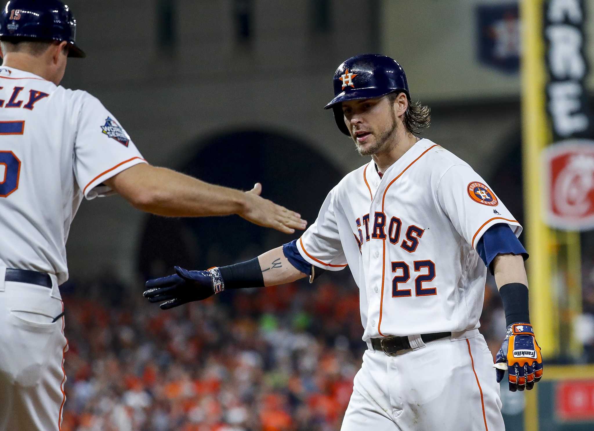 Playoff road takes Astros' Josh Reddick away from wife and twins