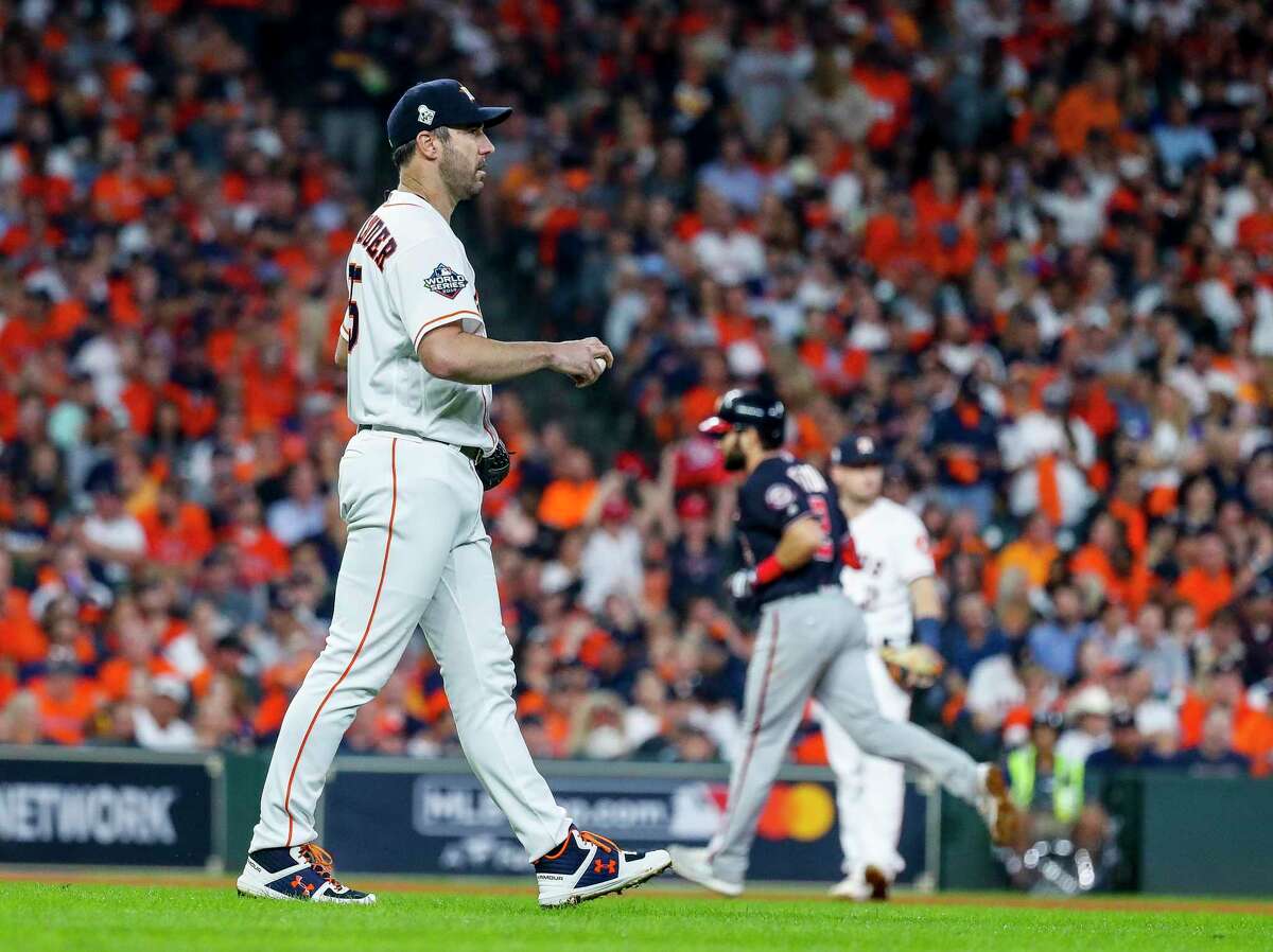 Houston Astros starting pitcher Justin Verlander (35) reacts after allowing a solo home run to Washington Nationals right fielder Adam Eaton (2) that tied the game 2-2 during the fifth inning of Game 6 of the World Series at Minute Maid Park on Tuesday, Oct. 29, 2019, in Houston.