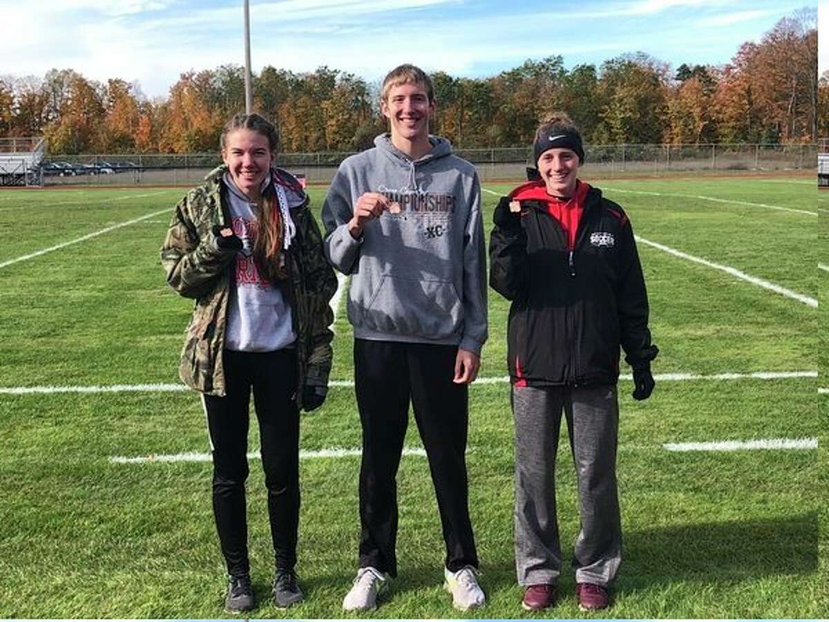 Regional medalists were, from left, Abbigail Kiaunis, Calvin Rohde and Taylor Harrison. (Courtesy photo)