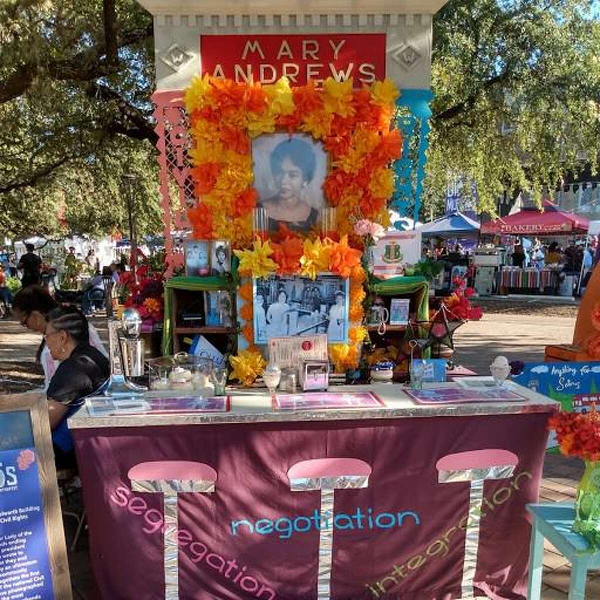 The Coalition for the Woolworth Building set up an altar at the 7th Annual Día de los Muertos Fest at Hemisfair in honor of the Woolworth Building's integrated lunch counter. The altar had a photograph of  Mary Andrews, who was a freshman at Our Lady of the Lake University and president of the NAACP’s local youth group when she wrote to San Antonio’s downtown store managers in 1960 asking that they end segregation at their lunch counters.