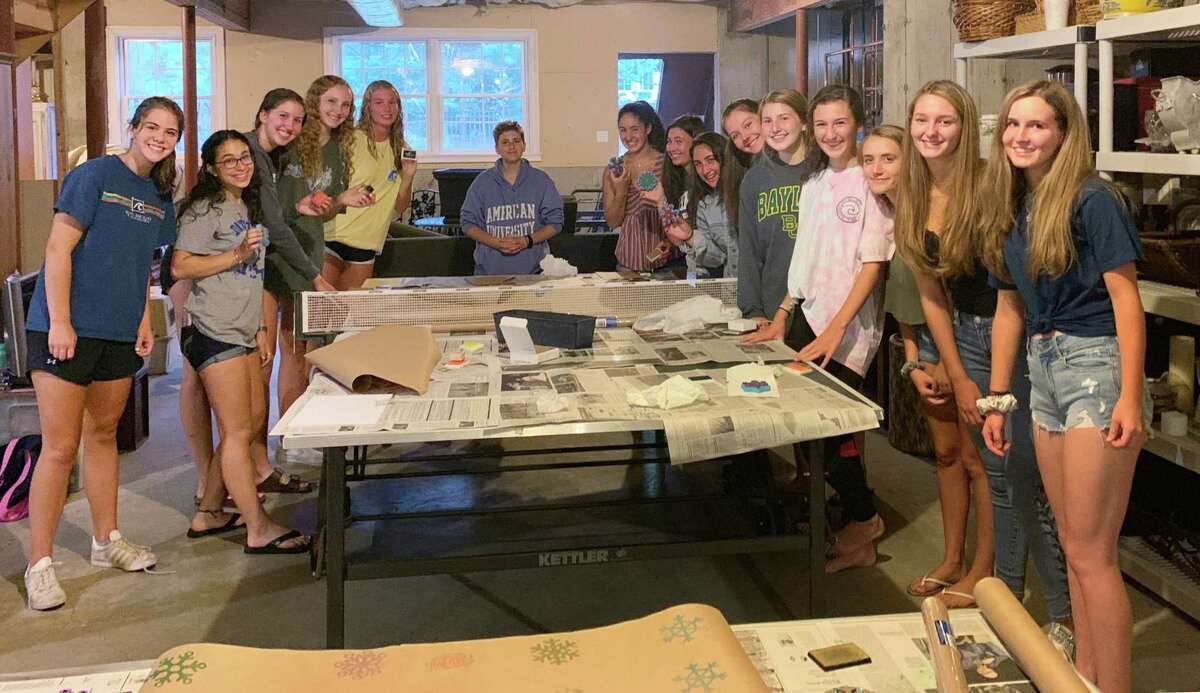 Members of The National Charity League (NCL) of Ridgefield recently made hand-stamped craft paper, gift tags and bows for Housatonic Habitat for Humanity’s “Wrapping for Habitat” fundraising event.