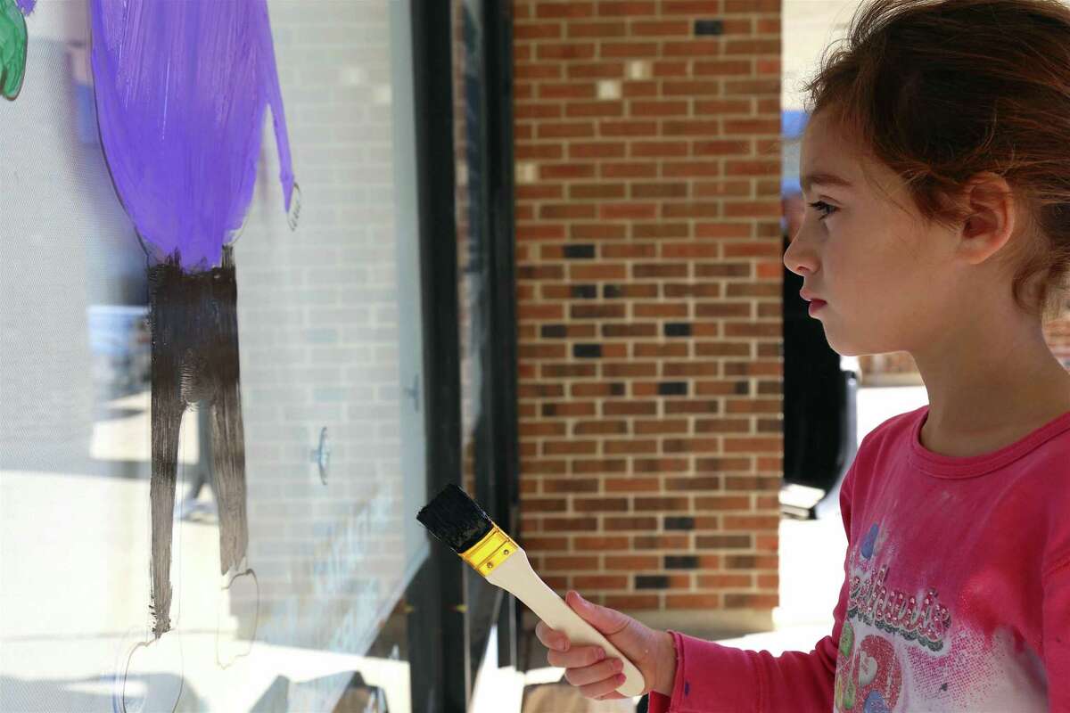 In Pictures Halloween window decorating in Westport