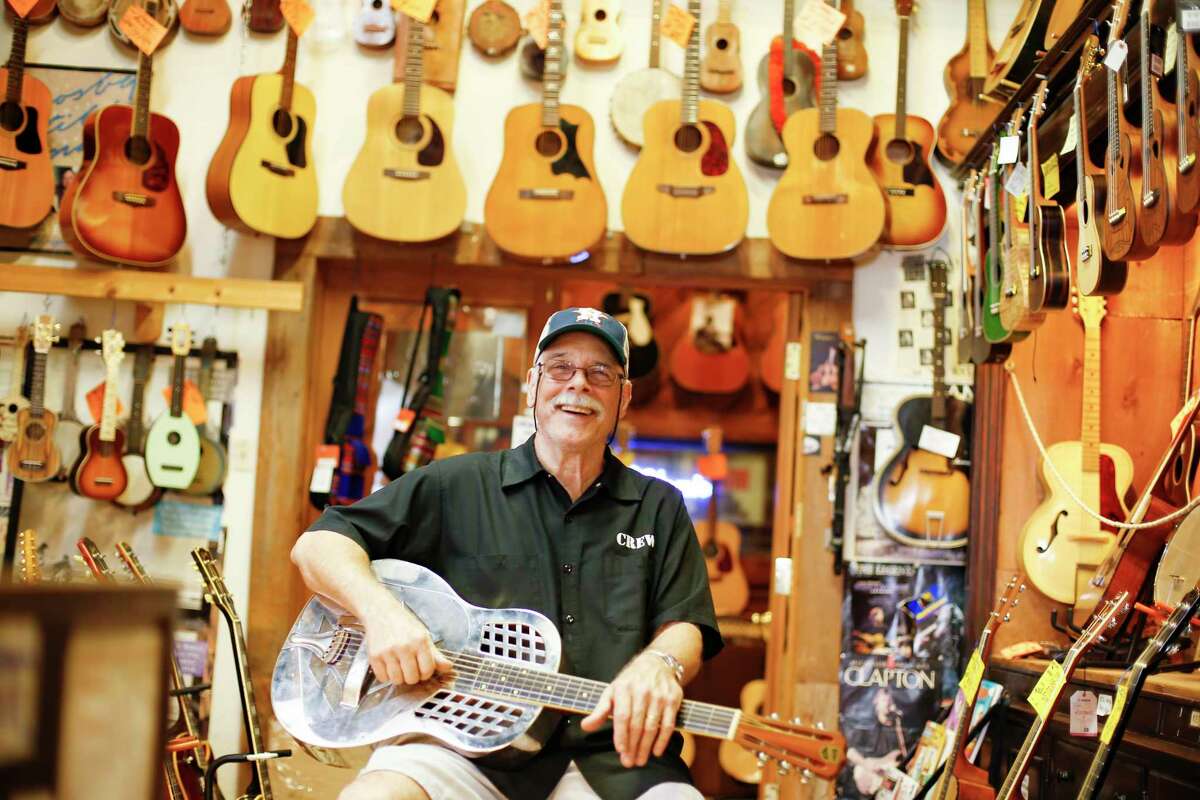 Rockin Robin's owner Bart Wittrock in his Houston guitar and music shop on Tuesday, Oct. 8, 2019.