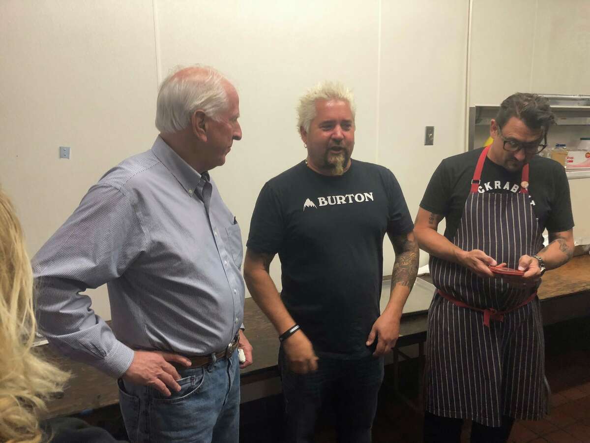 Guy Fieri, Tyler Florence, and other Bay Area chefs have been helping World Central Kitchen serve hot meals to Kincade Fire evacuees. Rep. Mike Thompson (left) met with some of the volunteers this week.
