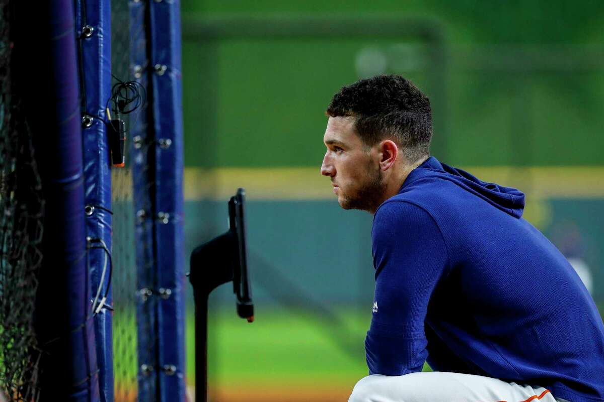 Houston Astros third baseman Alex Bregman (2) watches batting practice before Game 7 of the World Series at Minute Maid Park on Wednesday, Oct. 30, 2019, in Houston.