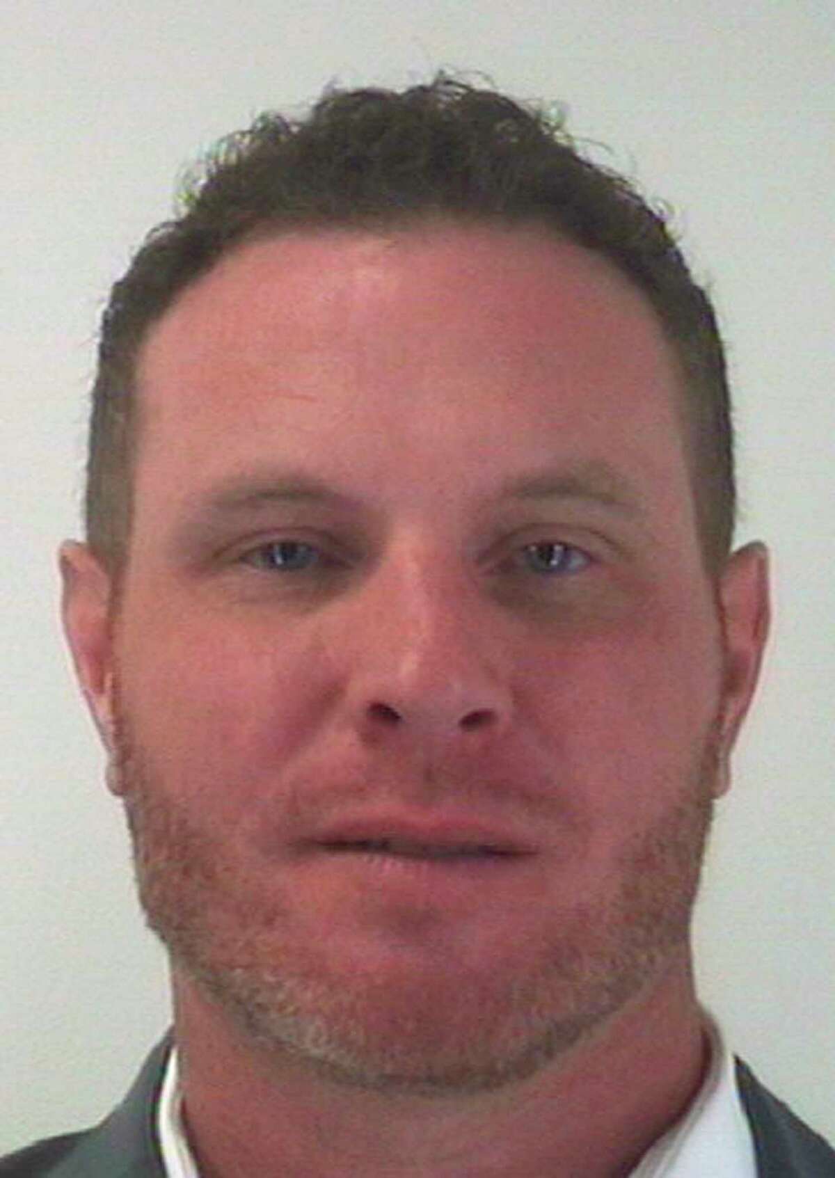 This undated photo provided by the Tarrant County Sheriff's Department in Fort Worth, Texas shows Josh Hamilton, a former Major League Baseball player with the Texas Rangers who was arrested Wednesday, Oct. 30, 2019 and charged with injury to a child after his 14-year-old daughter told his ex-wife that he'd struck her. Hamilton turned himself in Wednesday to the Tarrant County Jail in Fort Worth, Texas, and was released on $35,000 bond. (Tarrant County Sheriff's Department via AP)