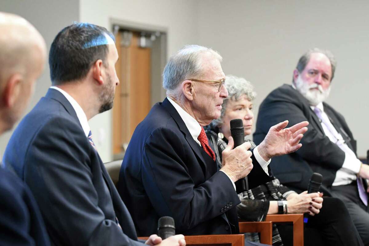 David Rossi, prosecutor, second from left, Terence Kindlon, defense attorney, Laurie Shanks, defense attorney, and Michael McDermott, prosecutor, right, take part in a Christopher Porco panel discussion moderated by Brendan Lyons, left, on Wednesday, Oct. 30, 2019, at the Hearst Media Center in Colonie, N.Y. (Will Waldron/Times Union)