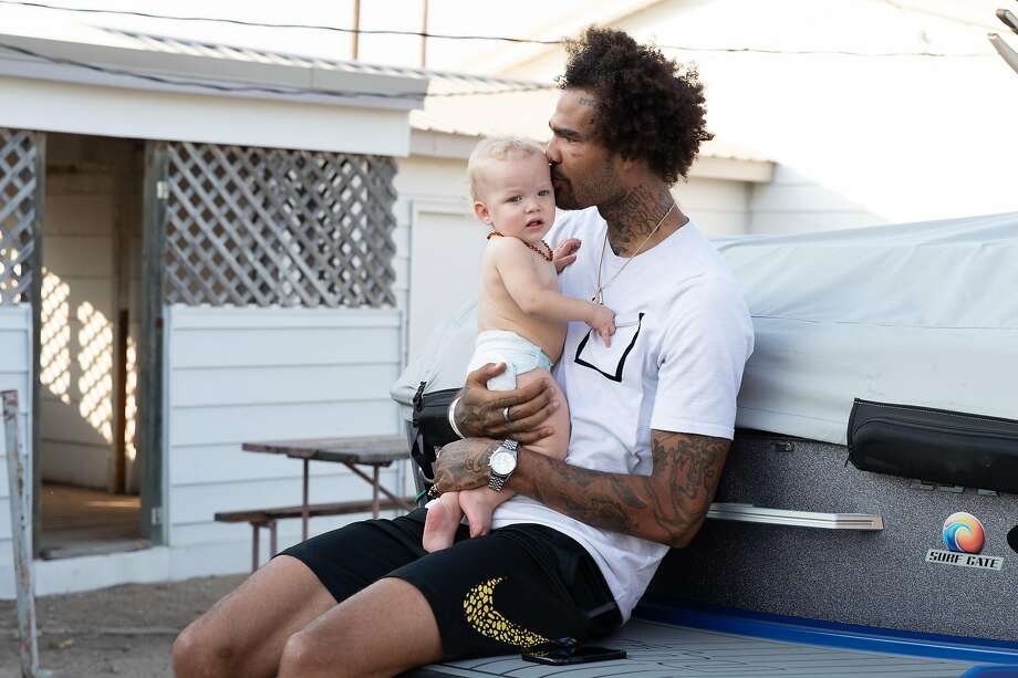 Willie Cauley-Stein holds his nephew, Brayven, while visiting family in Spearville, Kan. on August 2, 2019. Golden State Warriors Center Willie Cauley-Stein grew up in Spearville, Kan. Photo: Adam Shrimplin / Special To The Chronicle