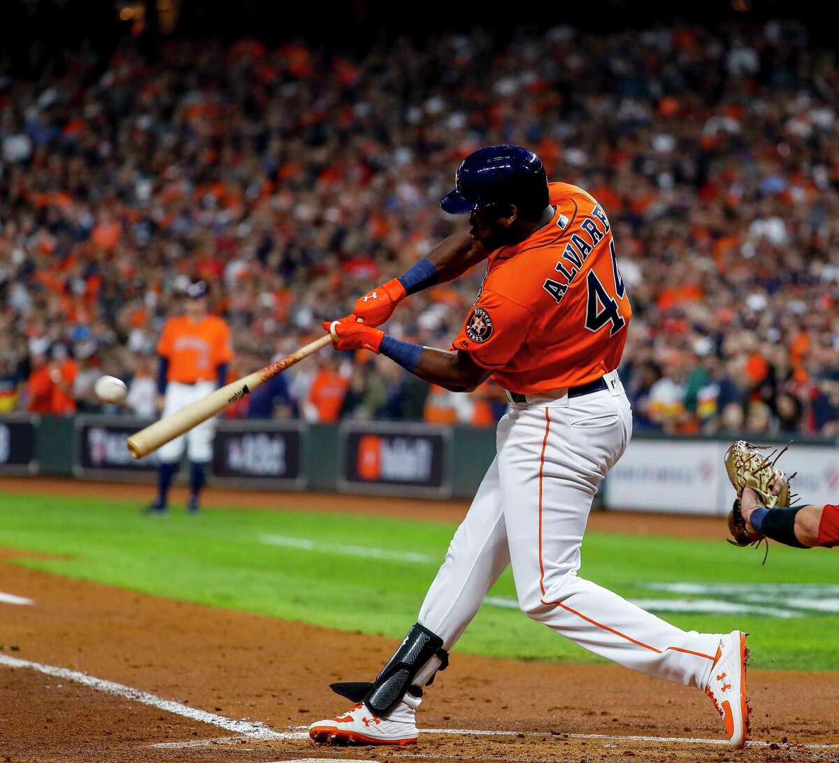 Houston Astros designated hitter Yordan Alvarez (44) hits a single to right field during the second inning of Game 7 of the World Series at Minute Maid Park on Wednesday, Oct. 30, 2019, in Houston.