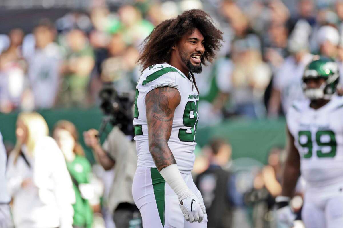 FILE - In this Oct. 13, 2019, file photo New York Jets' Leonard Williams warms-up before an NFL football game against the Dallas Cowboys in East Rutherford, N.J. A person with direct knowledge of the deal says the New York Jets have traded Williams to the Giants for a third-round draft pick next year and a fifth-rounder in 2021. (AP Photo/Adam Hunger, File)