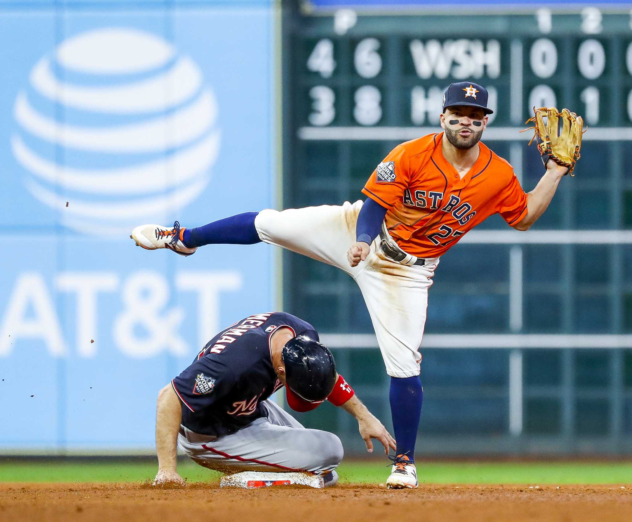 02 October 2016: Houston Astros Second base Jose Altuve (27) gets a hug  from a teammate after his hit in the 9th inning won him the batting title  in the game against