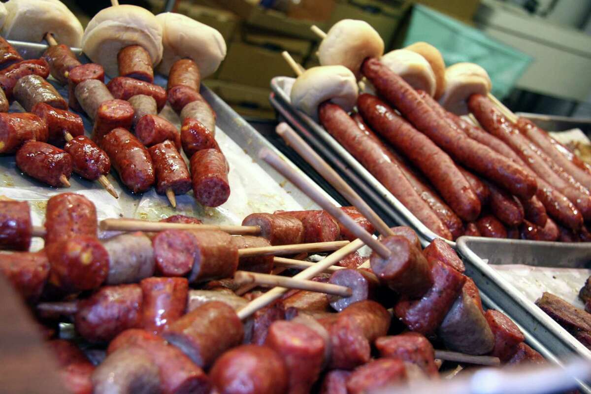 This November 2006 photo provided by the Wurstfest Association of New Braunfels shows sausage being prepared for sale at Wurstfest, an annual German festival held in New Braunfels, Texas. (AP Photo/Wurstfest Association of New Braunfels, K. Jessie Slaten)