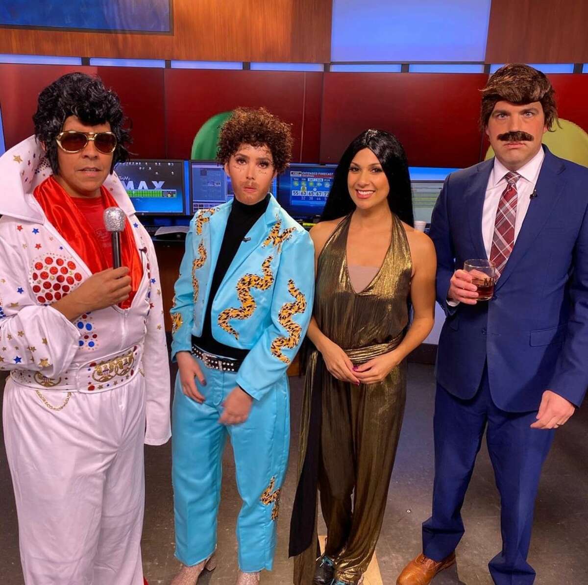 "Fox News First" morning crew dressed up for Halloween. Ernie Zuniga (far left) as Elvis, Breanna Barrs (left) as Post Malone, Vanessa Martin as Cher and Brad Sowder as Ron Burgandy.