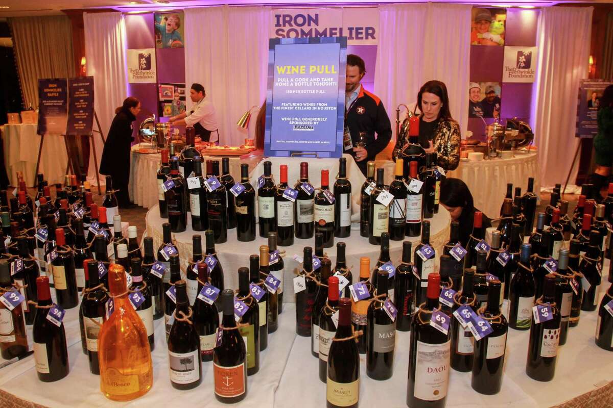 The Wine Pull at the annual Iron Sommelier competition, which helps raise money for the Periwinkle Foundation. The event was held at The Houstonian.