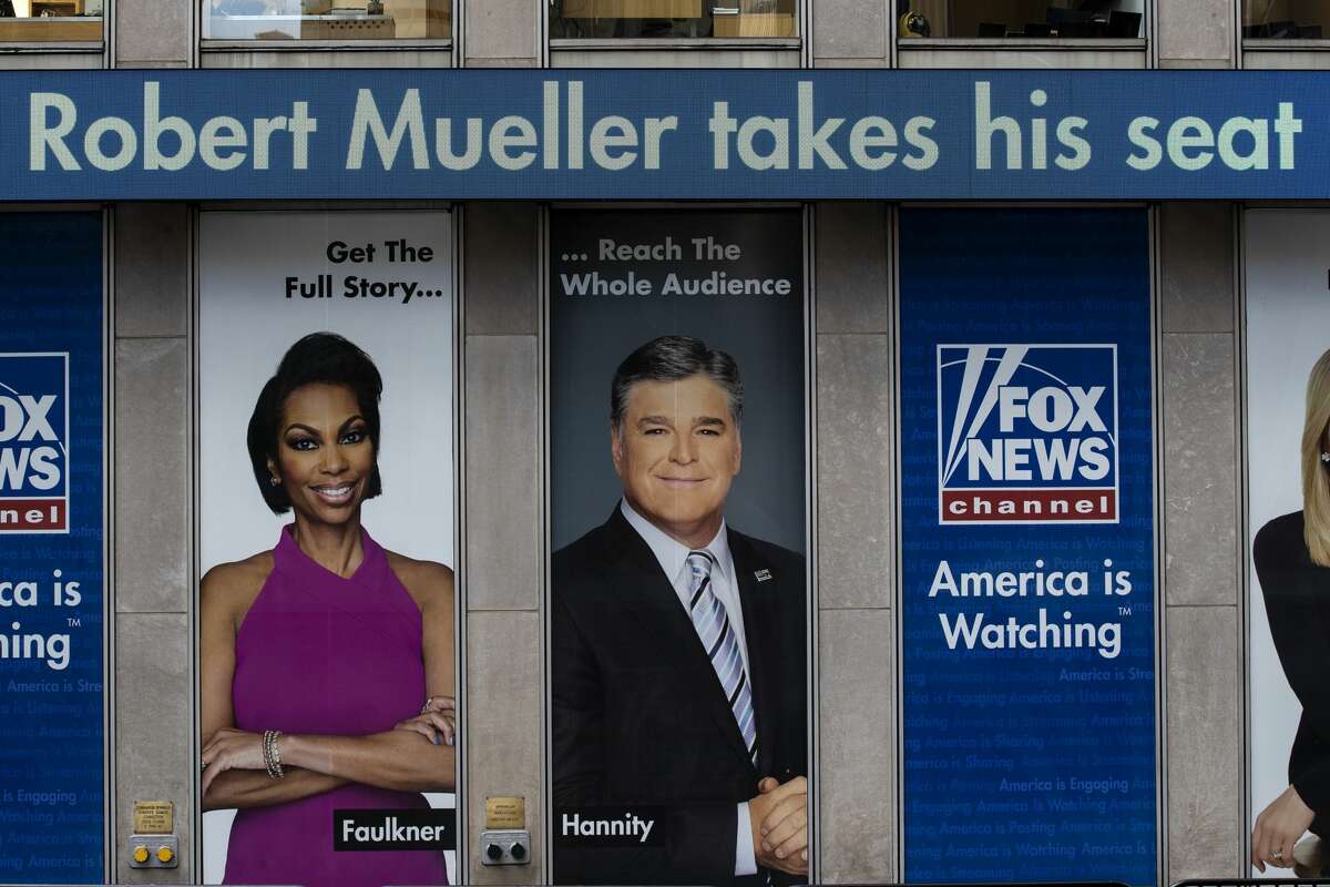 FILE: Headlines about former Special Counsel Robert Mueller's testimony to Congress are displayed on the ticker outside of the Fox News headquarters on July 24, 2019 in New York City.
