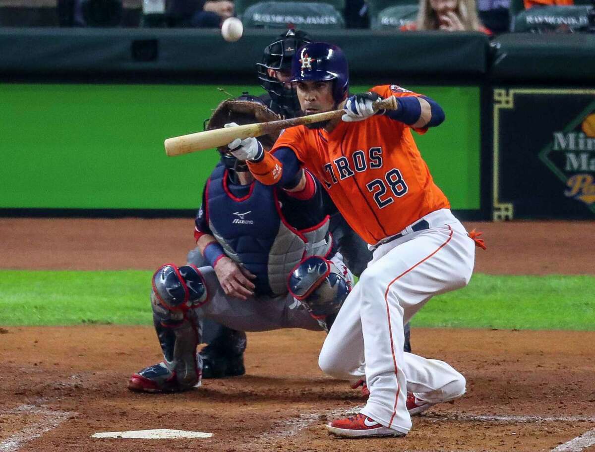 Called on to sacrifice with two men aboard, Astros catcher Robinson Chirinos pops up his bunt attempt, resulting in the first out of the second inning in Game 7 of the World Series.
