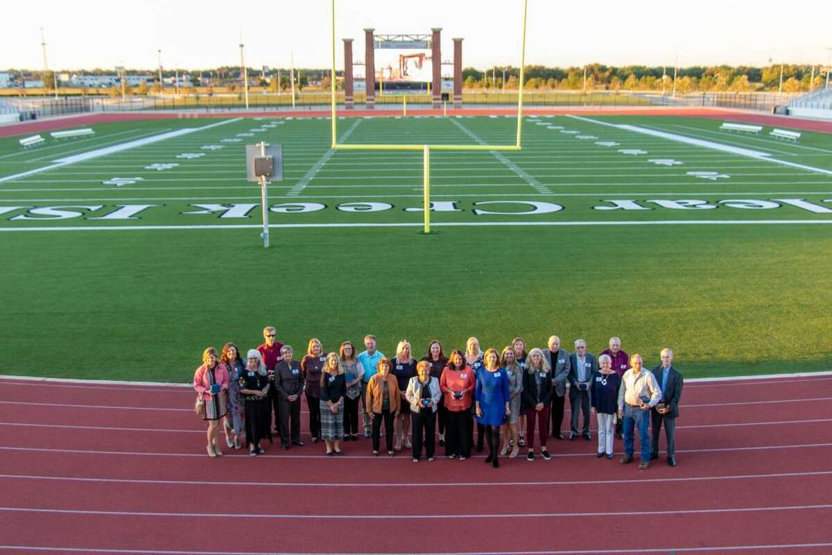 The 2019 Clear Creek Hall of Honor inductees are shown during a ceremony Saturday at Challenger Columbia Stadium.