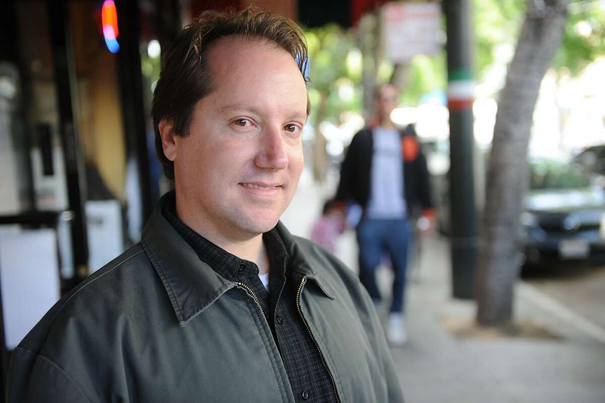 Jon Golinger, president of the Telegraph Hill Dwellers, poses for a photo in North Beach on June 27, 2011. The area is going through a revitalization with several new art galleries, stores and restuarants moving into the area.