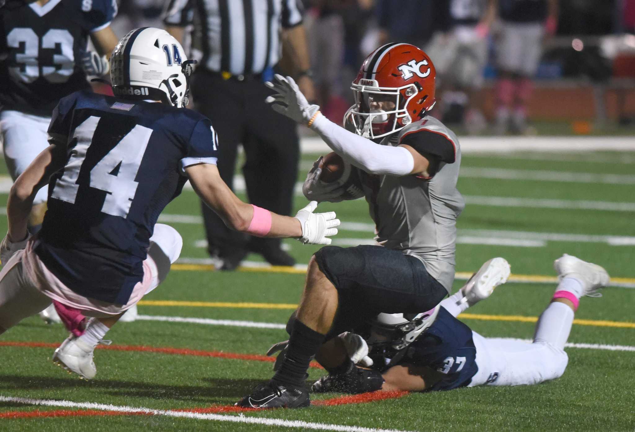 New Canaan football rebounds, shuts out Warde in home opener