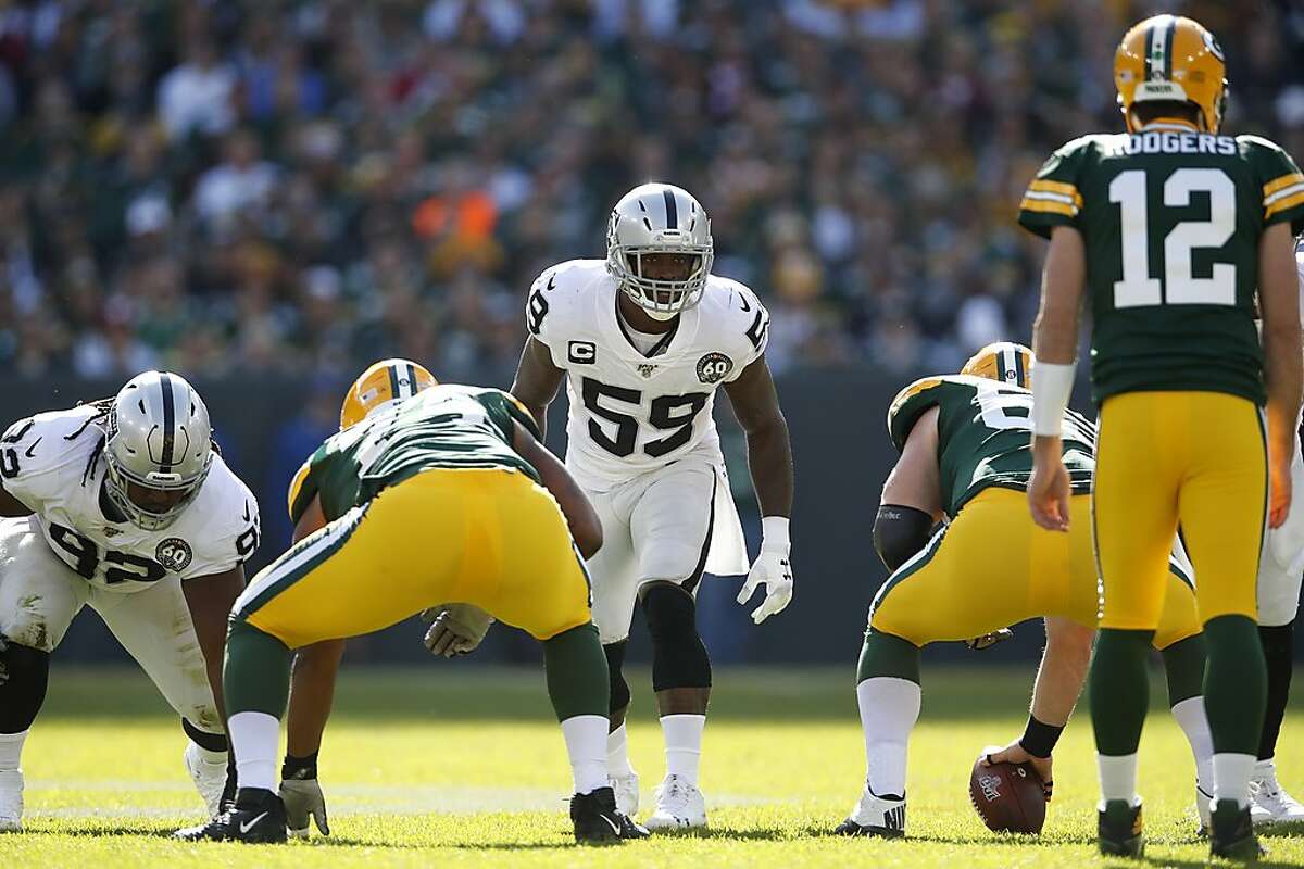 Oakland Raiders outside linebacker Tahir Whitehead (59) lines up against the Green Bay Packers during an NFL football game Sunday, Oct. 20, 2019, in Green Bay, Wis. The Packers won the game 42-24. (Jeff Haynes/AP Images for Panini)