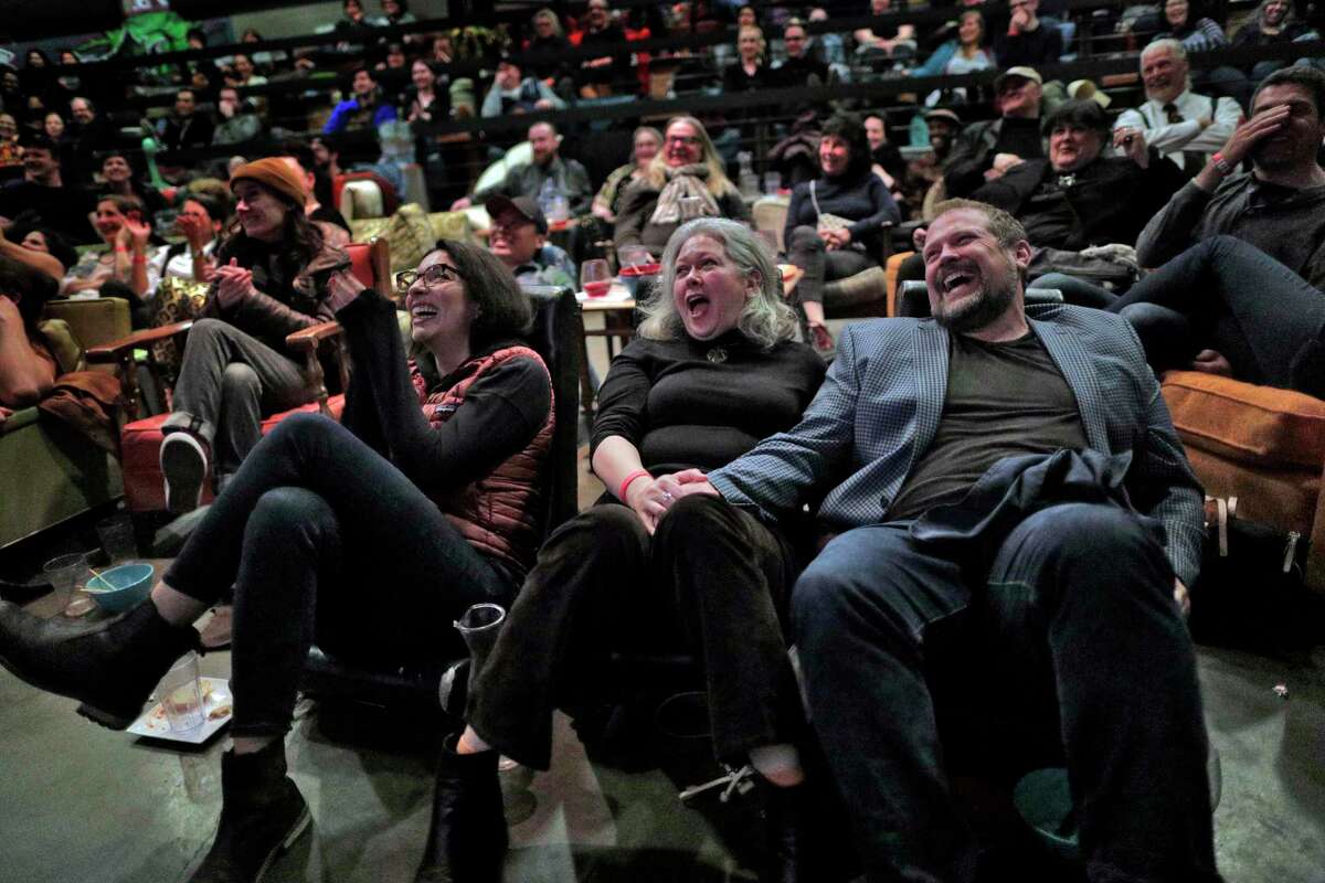 Sarah Tanquary, left, Donna Morton, center, Frank Connolly, right, laughing at the speech by Olivia Coleman after she won the Academy Award for Best Actress during an Oscars Night Party at the New Parkway Theater in Oakland, Calif., Feb. 24. What’s considered humorous is different for everyone, but humor is a big part of life.