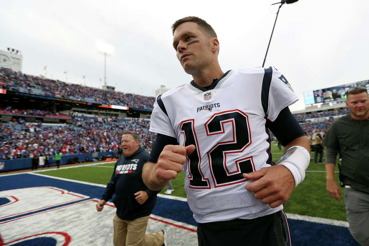Tom Brady (12) of the New England Patriots runs off the field after a game against the Buffalo Bills at New Era Field on Sept. 29, 2019 in Orchard Park, N.Y. (Bryan M. Bennett/Getty Images/TNS)