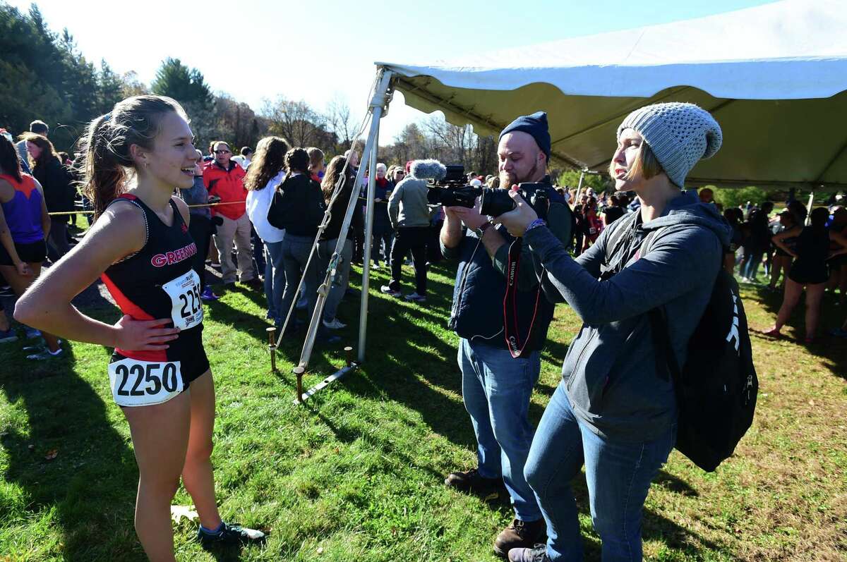 State Open champ Mari Noble of Greenwich is interviewed after the race on Friday.