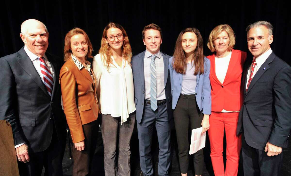 From left, Sandy Litvack, Jill Oberlander, student moderators Dylan Mini, Dylan Maloney, Wyatt Radzin, Lauren Rabin and Fred Camillo are photograph prior to al debate between candidates for the office of Greenwich First Selectman and Selectman at Greenwich High School's performing arts center on Nov. 1, 2019. The student run and student led debate allowed candidates to respond to a variety of questions collected from from GHS students.