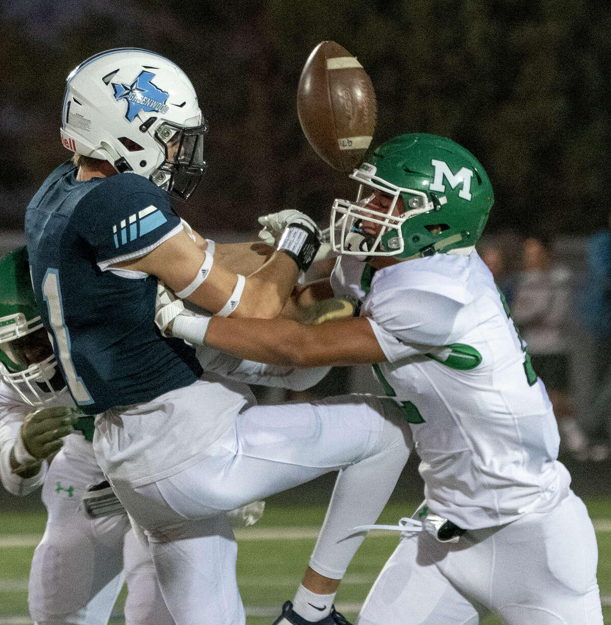 Greenwood's Brody Ray can't hang on to a reception as Monahans' Bradden Kesey defends 11/01/19 at J.M. King Memorial Stadium. Tim Fischer/Reporter-Telegram