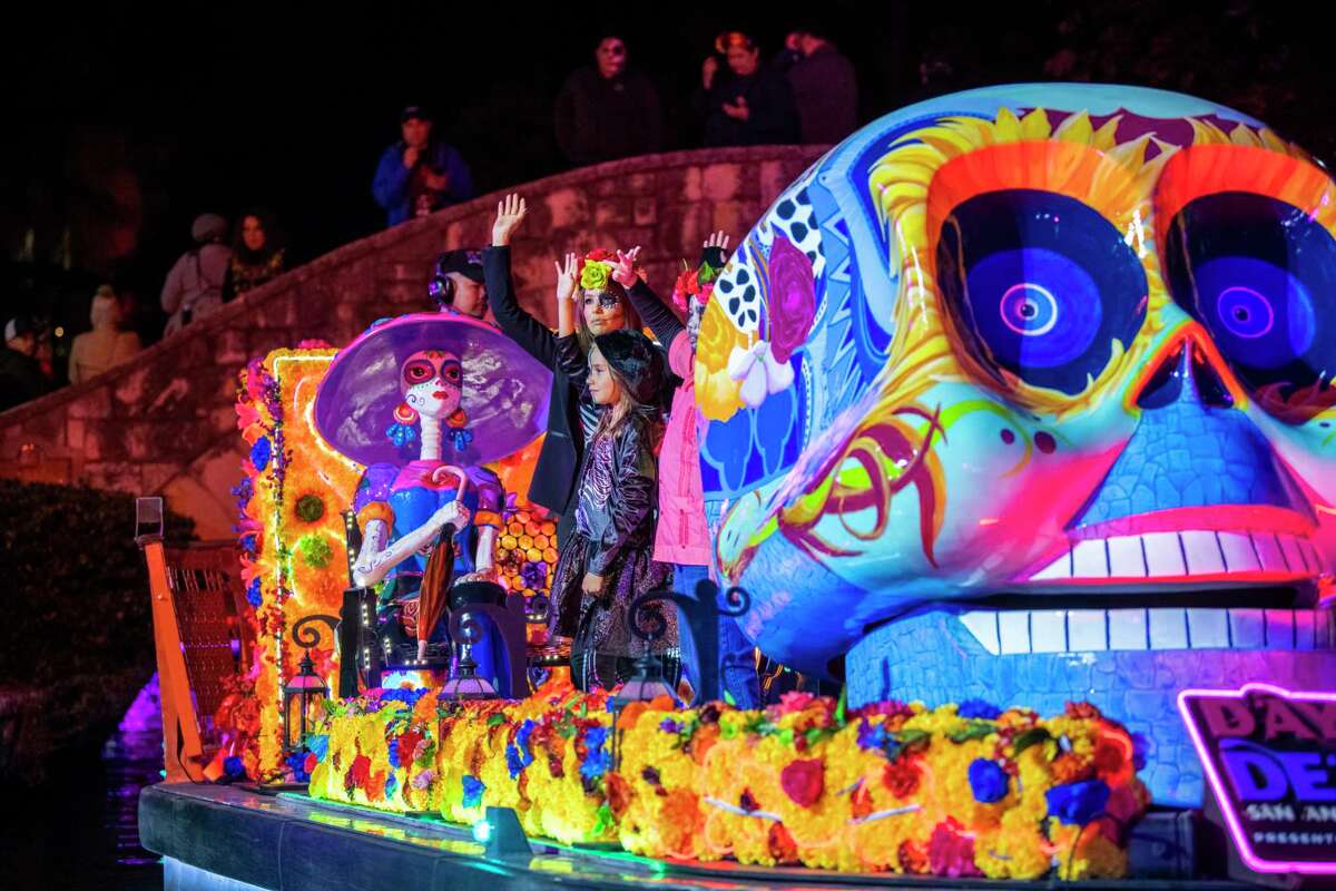 San Antonio’s first Day of the Dead river parade draws crowds on cold night