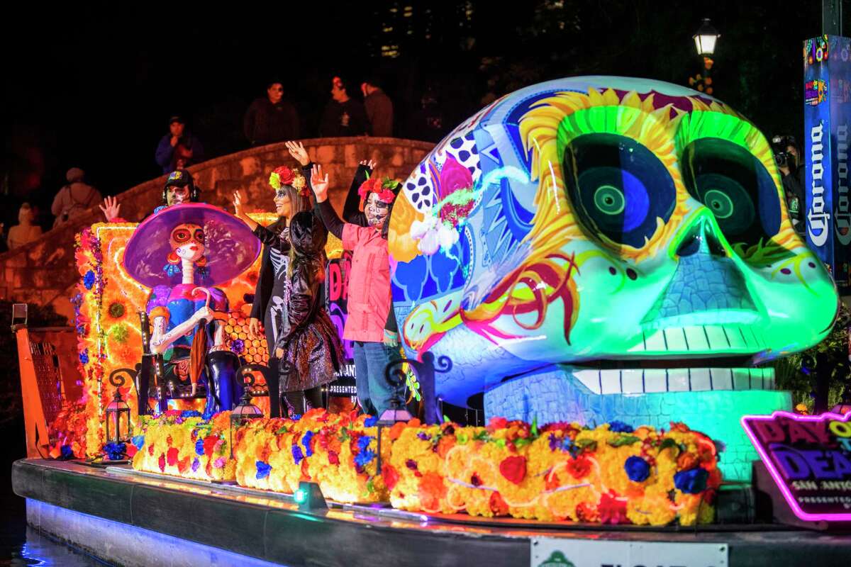 San Antonio's first Day of the Dead river parade draws crowds on cold night