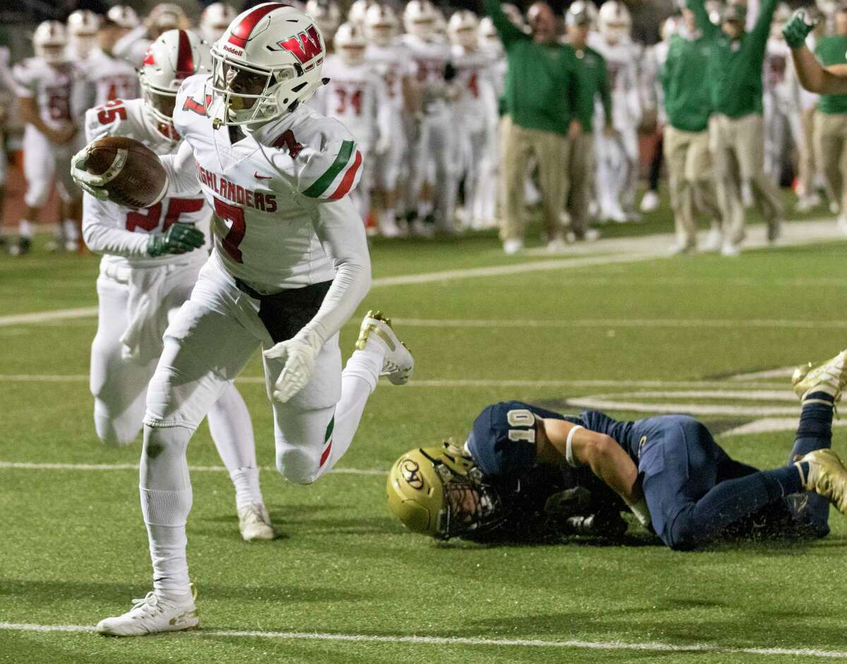 The Woodlands wide receiver Teddy Knox (7) leaves Klein Collins linebacker Jacob Allison (10) behind as he crosses into the endzone during a District 15-6A high school football game Friday, November 1, 2019 at Klein Memorial Stadium in Spring.