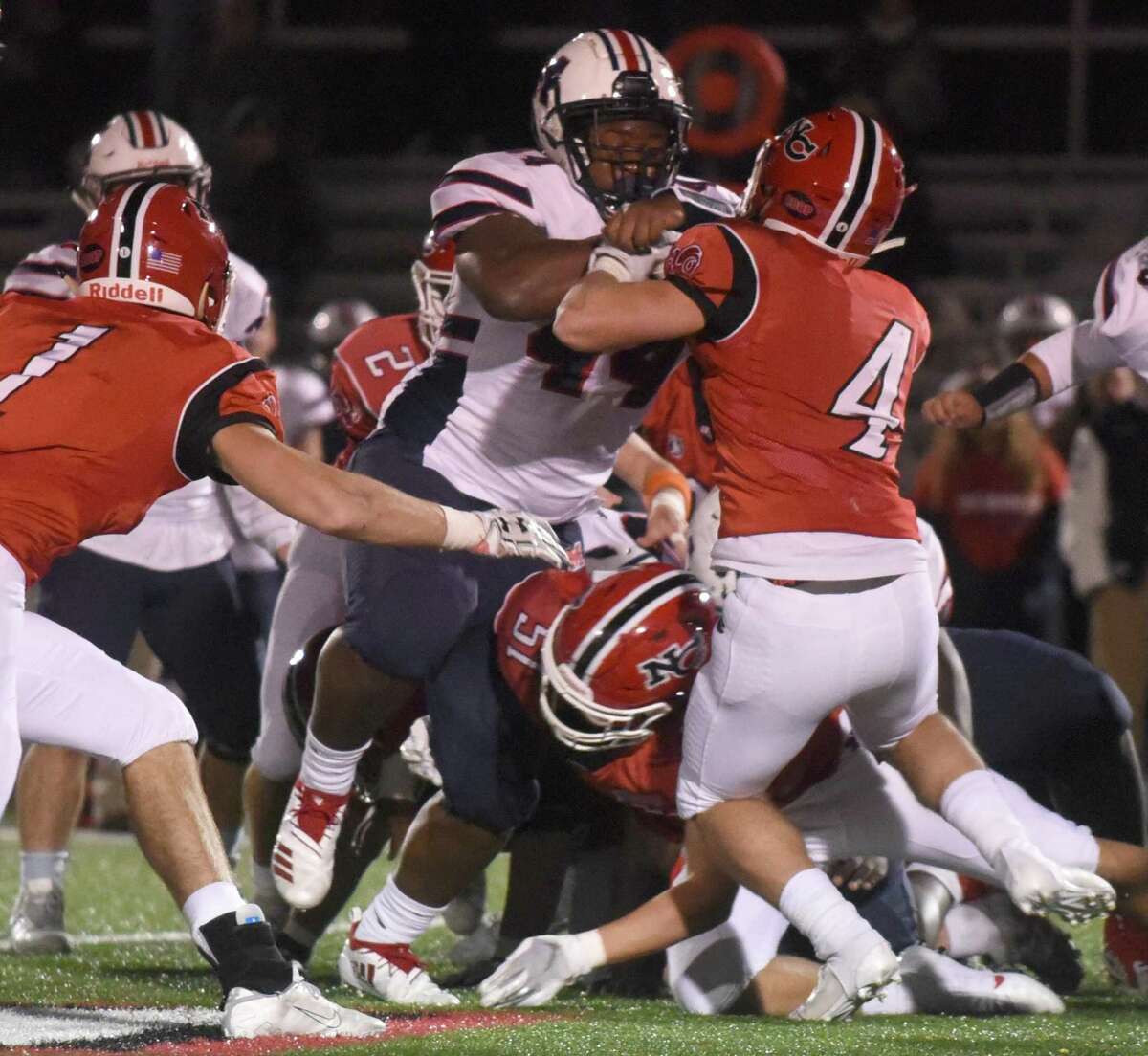 Pyne’s five TD passes lead New Canaan past McMahon