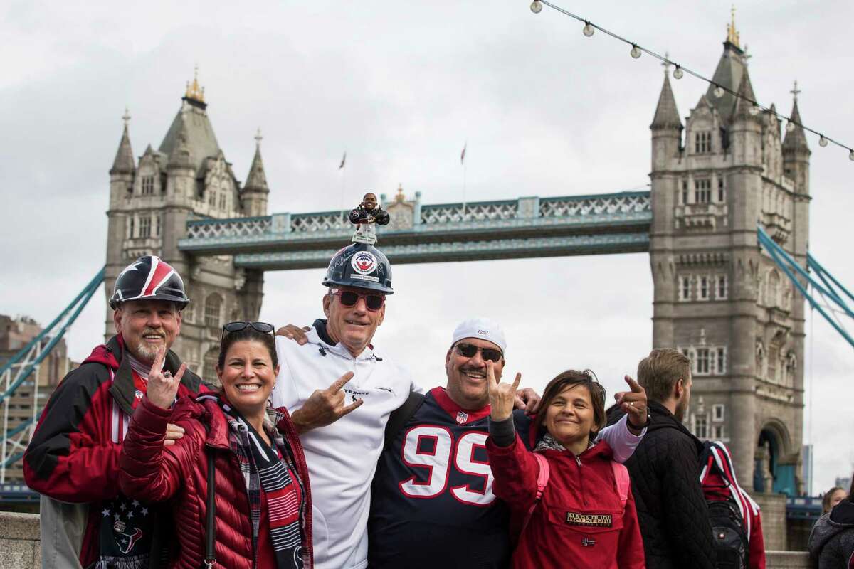 Houston Texans fans gather at More London near the Tower Bridge on Saturday, Nov. 2, 2019, in London. The Texans play the Jacksonville Jaguars at Wembley Stadium on Sunday.