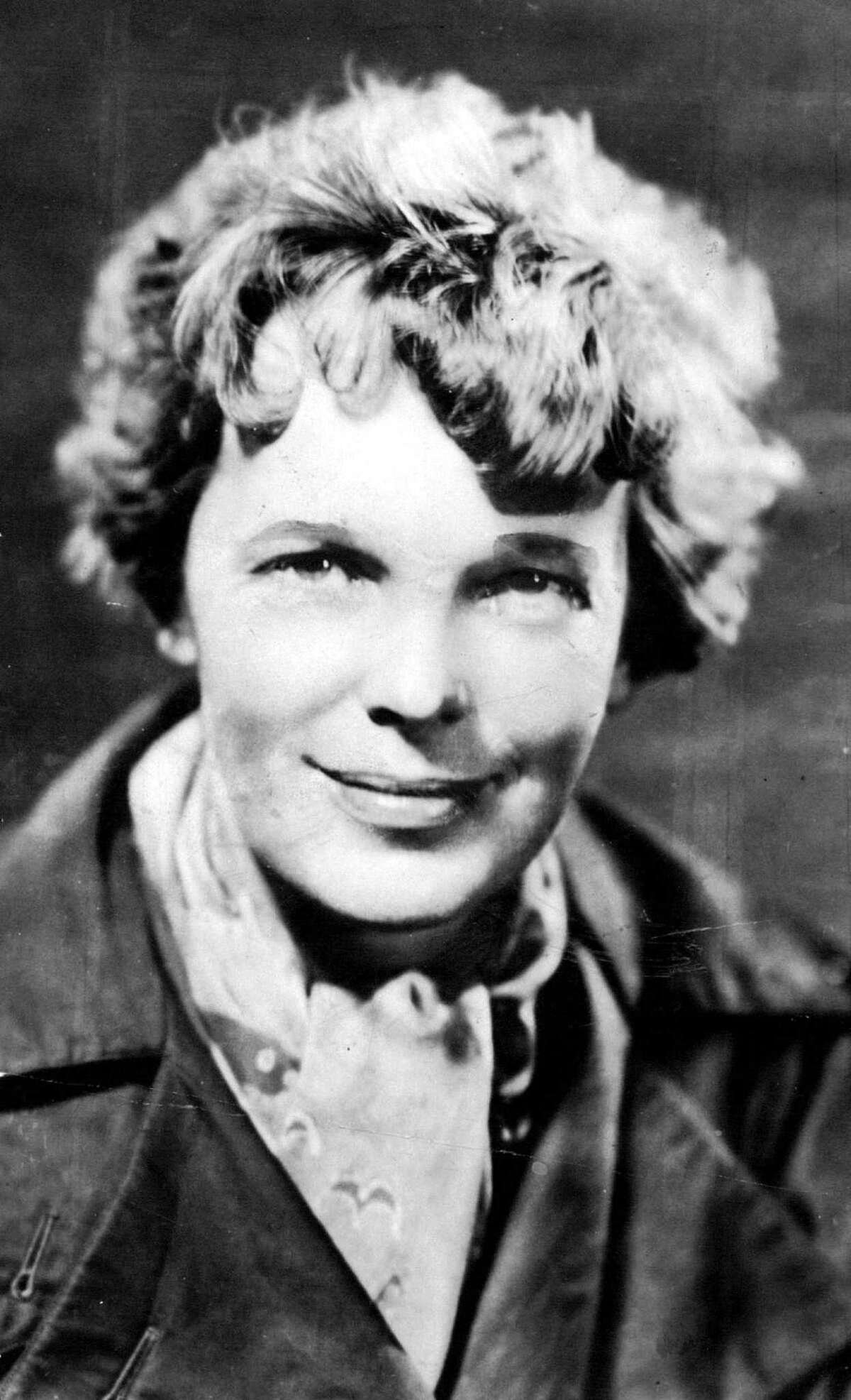 This undated photo shows Amelia Earhart. Earhart investigator Ric Gillespie hopes that modern computer enhancements of a part of the photo of Earhart's plane will link it to a piece of possible airplane wreckage discovered a quarter century ago on a tiny Pacific island in the area where Earhart disappeared. (AP Photo/The Miami Herald)