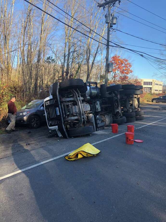 Rollover on Pepper Street in Monroe, Conn., on Friday, Nov. 1, 2019. Photo: Contributed Photo / Stepney Fire Department