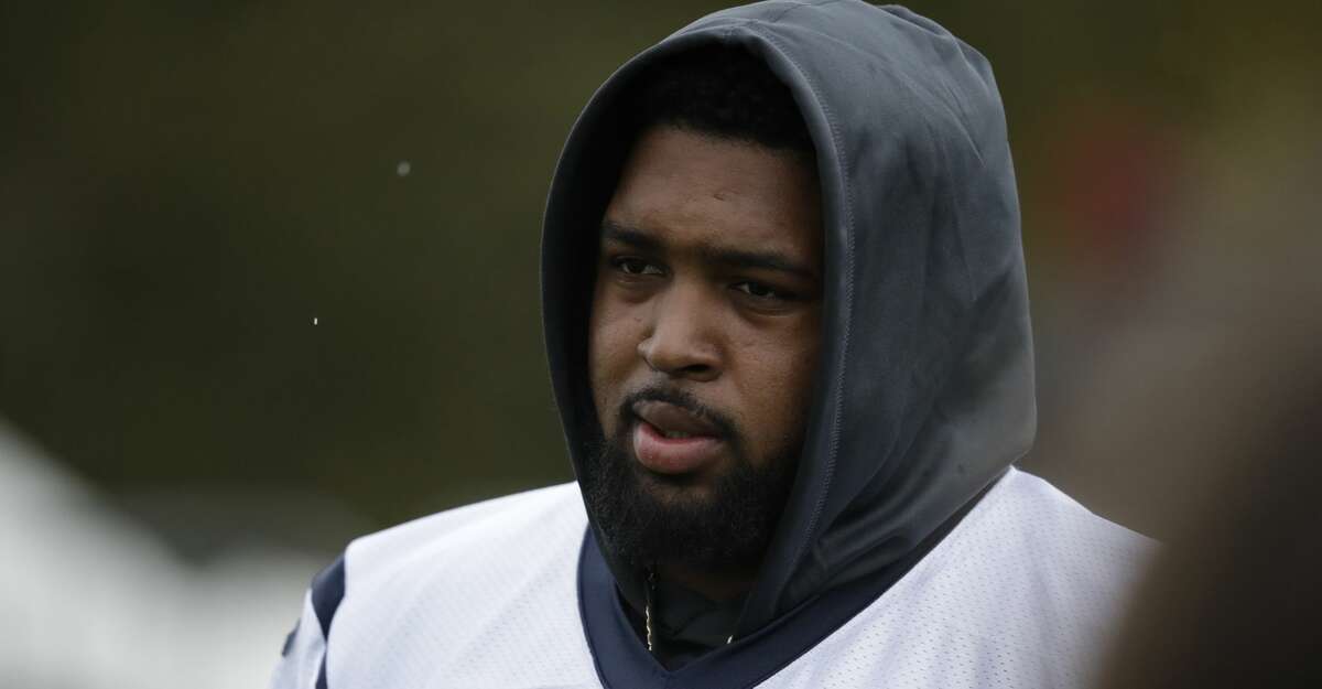 Houston Texans' offensive tackle Tytus Howard, 71, arrives for an NFL practice session at the London Irish rugby team training ground in the Sunbury-on-Thames suburb of south west London, Friday, Nov. 1, 2019. The Houston Texans are preparing for an NFL regular season game against the Jacksonville Jaguars in London on Sunday. (AP Photo/Matt Dunham)