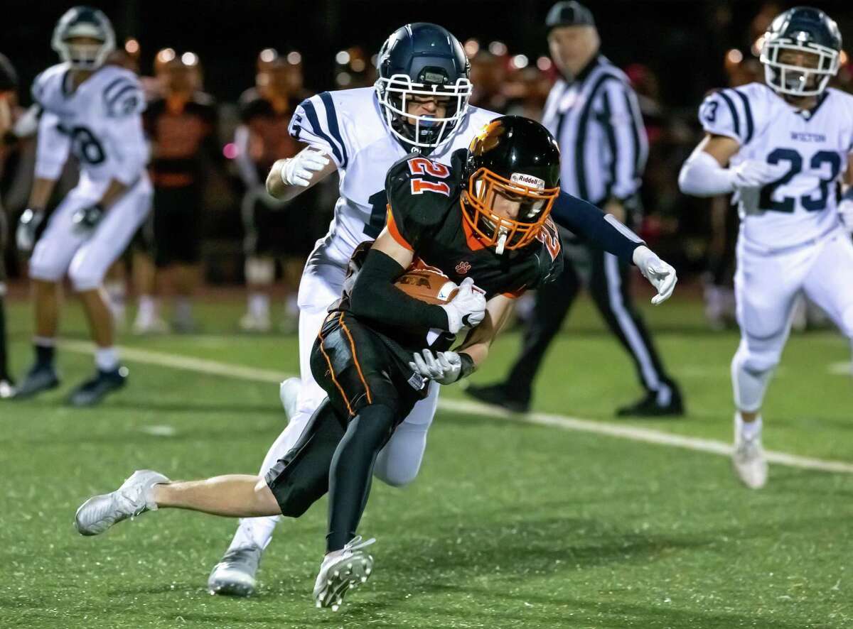 Owen Gaydos (shown in a game earlier this season) scored three touchdowns as Ridgefield routed Stamford, 56-12, on Friday, Nov. 1, in Ridgefield.