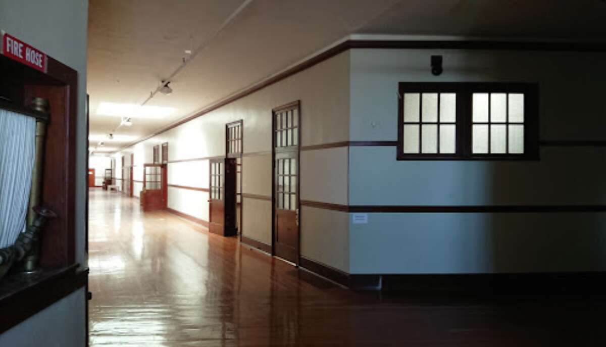 FILE - The hallways of the vacated school are seen in 2018.