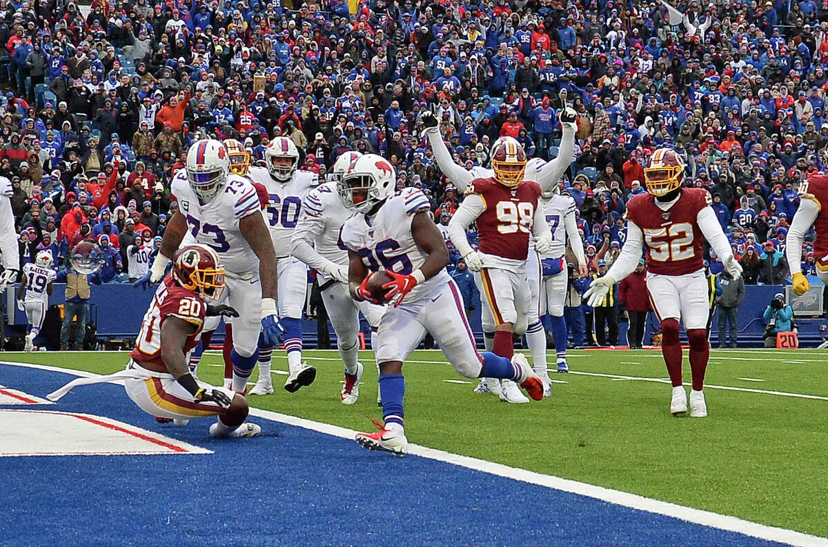 Buffalo Bills running back Devin Singletary (26) rushes for a two-yard touchdown during the second half of an NFL football game against the Washington Redskins, Sunday, Nov. 3, 2019, in Orchard Park, N.Y. (AP Photo/Adrian Kraus)