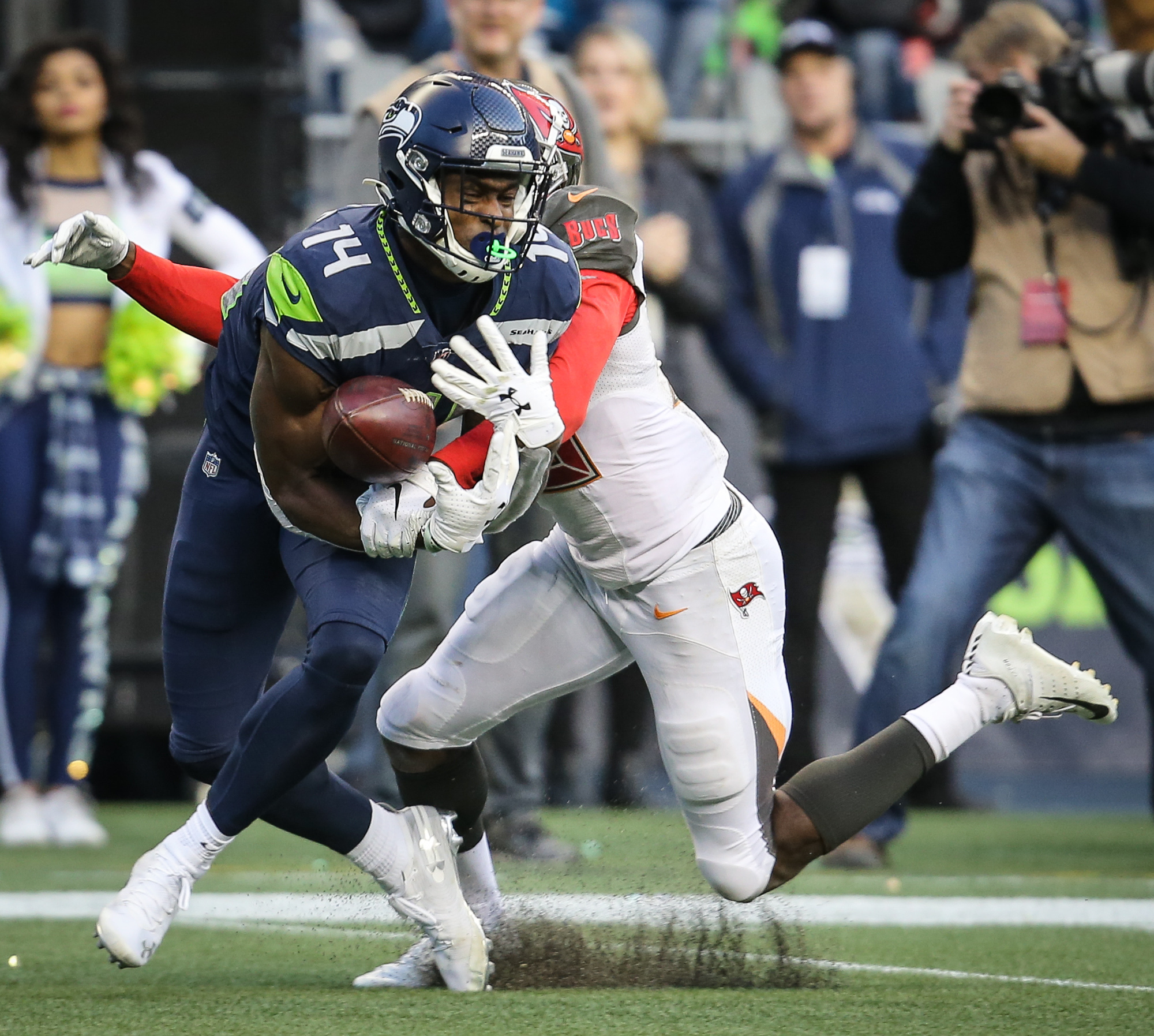 Seattle Seahawks' D.K. Metcalf catches a touchdown pass during the second  half of an NFL wild-card playoff football game against the Philadelphia  Eagles, Sunday, Jan. 5, 2020, in Philadelphia. (AP Photo/Julio Cortez