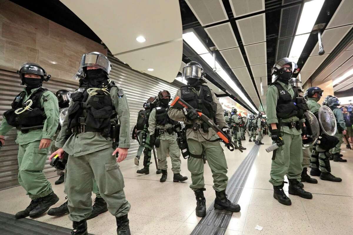 Riot Police Storm Several Hong Kong Malls