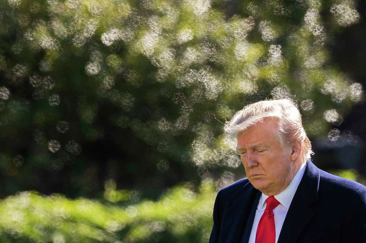 President Donald Trump walks on the South Lawn upon arrival at the White House in Washington, Sunday, Nov. 3, 2019. (AP Photo/Manuel Balce Ceneta)
