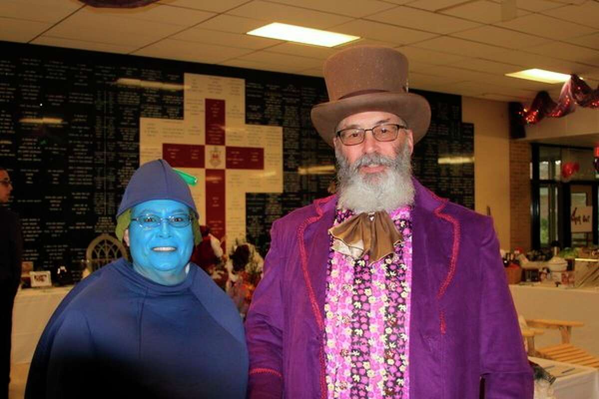 Crystal and Jerry Van Sickle arrived to Manistee Catholic Central's 2019 HARVEST Fling dressed as Violet Beauregarde and Willy Wonka.