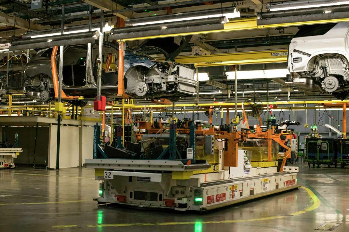 Buick vehicles on the assembly line at the General Motors Lansing Delta Township Assembly Plant in Lansing, Mich. The company and others have sided with the Trump administration in its battle over regulations designed to fight climate change.